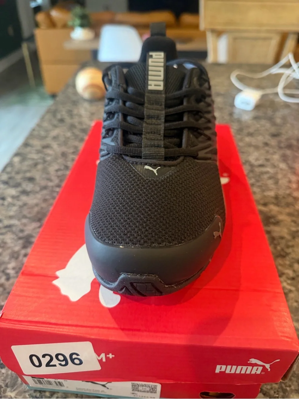 Puma Kids Black Sneaker with Silver Stripe Accents